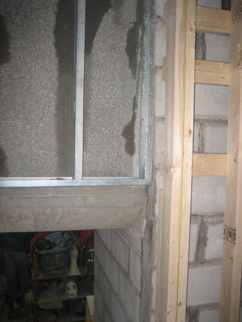 Durock, cement board plus steel studs over the basement stairs