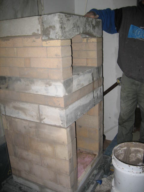 Setting the capstone for the oven