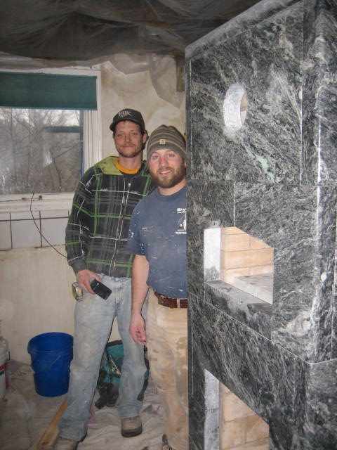 Adam Gauvin, honorary mason, and Jeremy Brown, lead mason